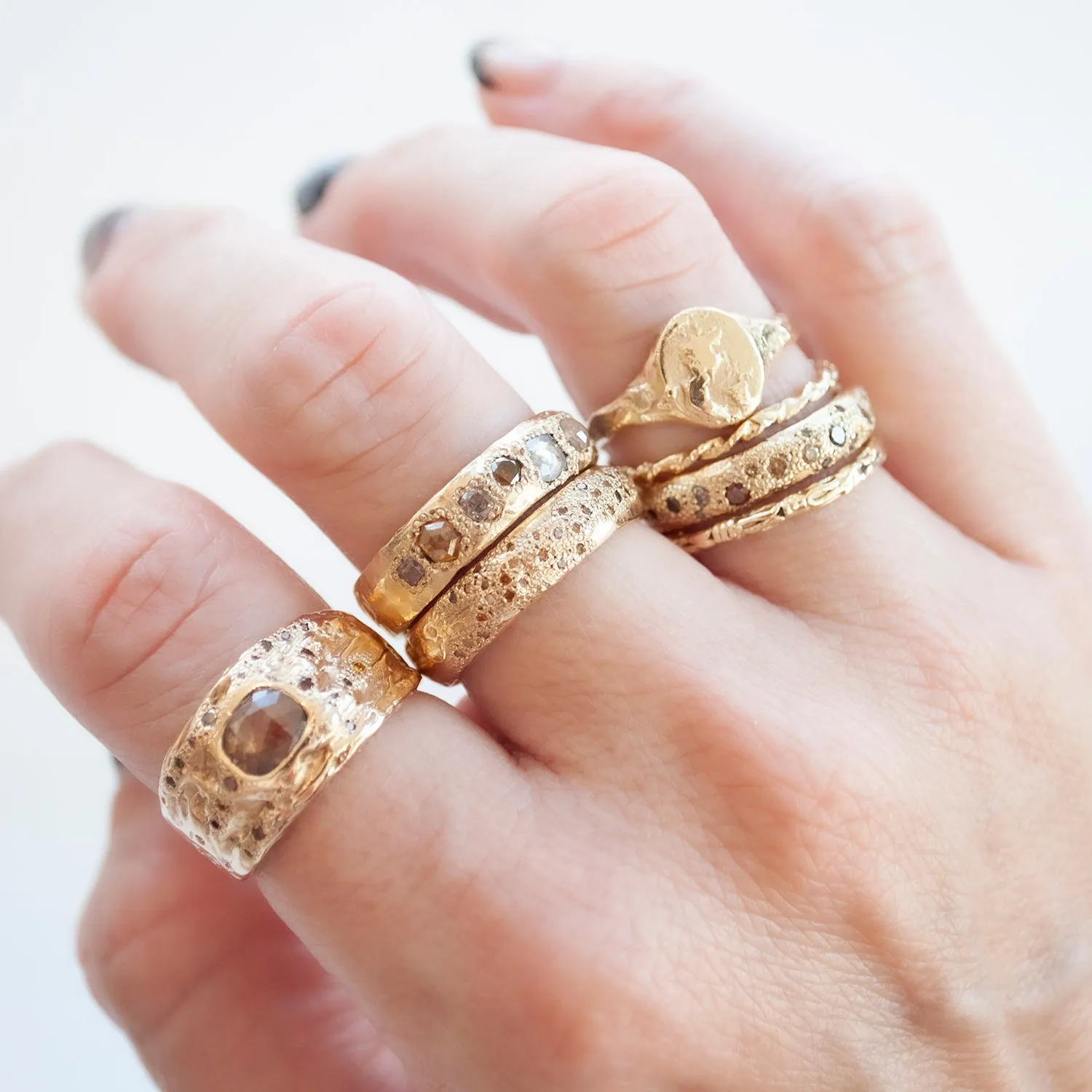 LXXXII Twist Gold Band