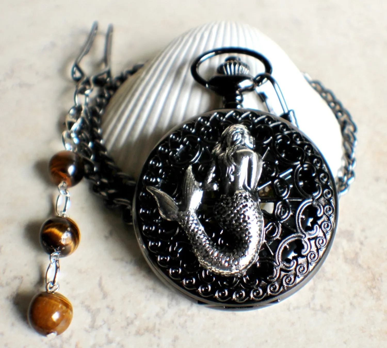 Mechanical mermaid pocket watch.