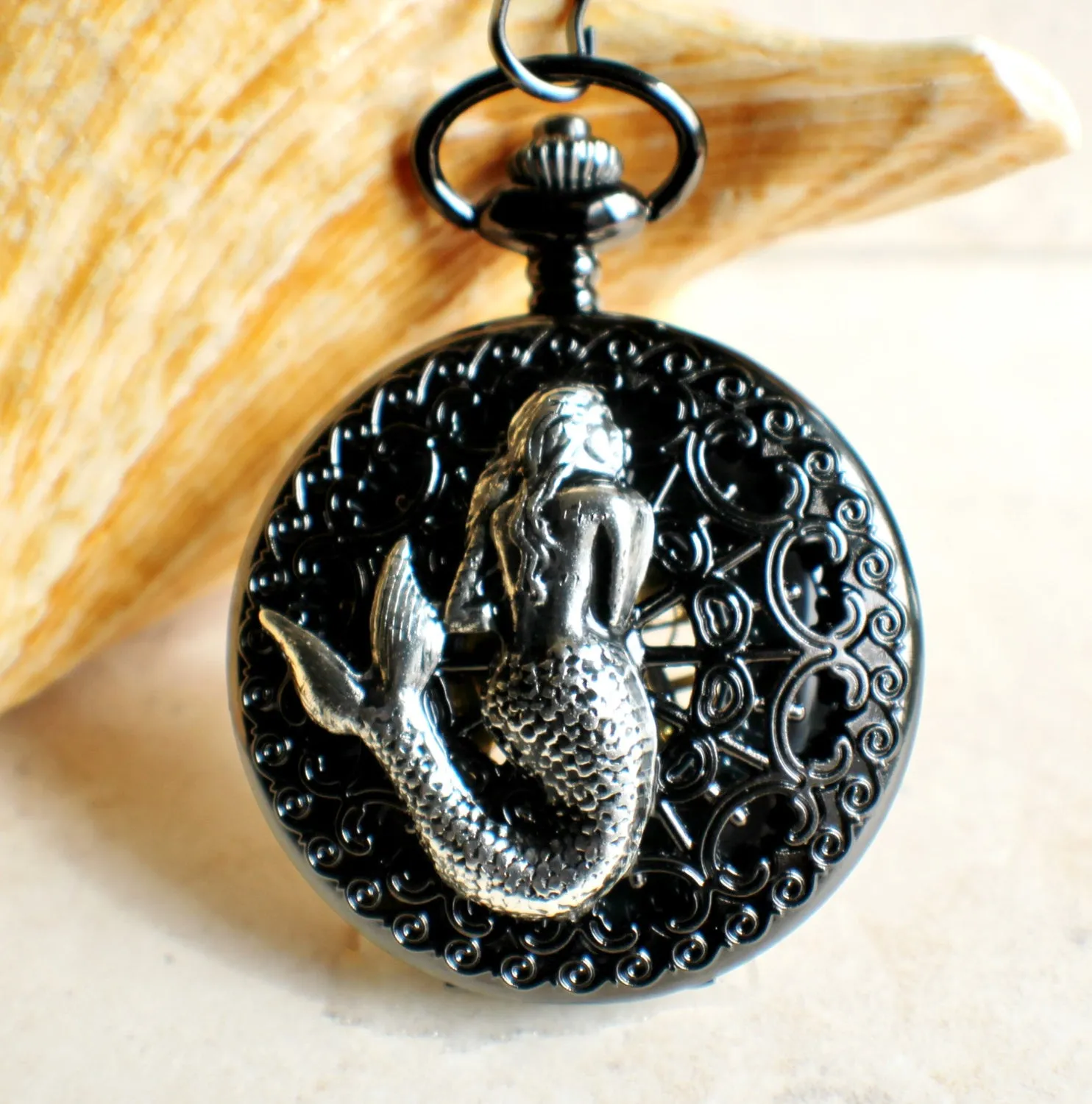 Mechanical mermaid pocket watch.