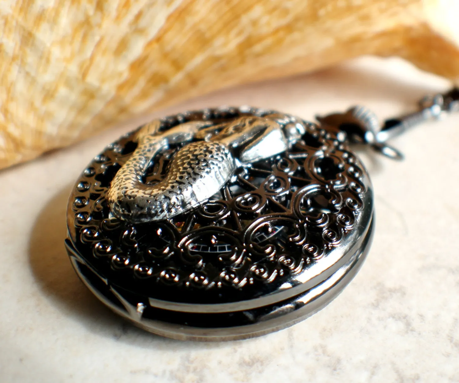 Mechanical mermaid pocket watch.
