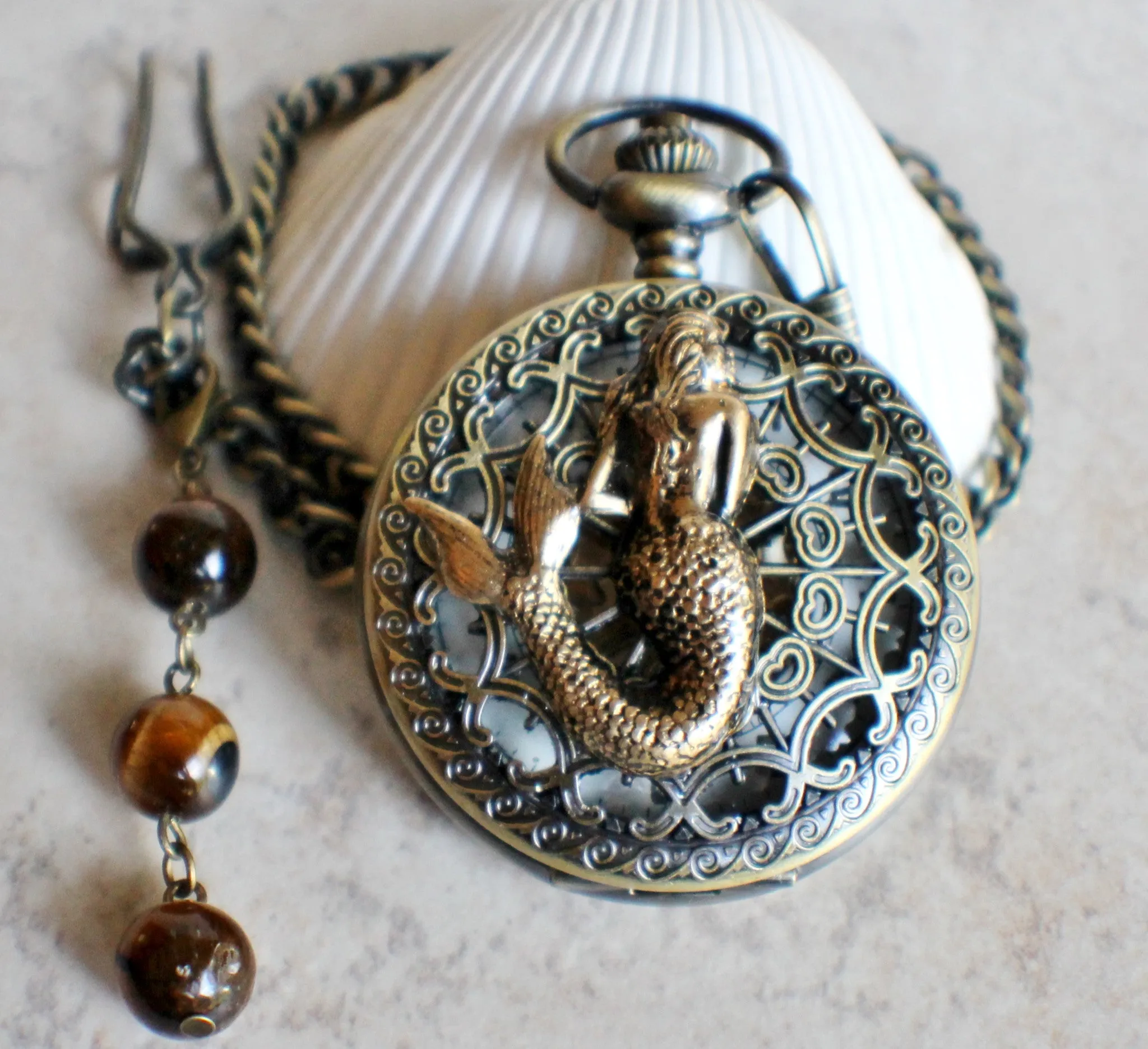 Mermaid pocket watch, men's mechanical pocket watch with mermaid mounted on front cover.