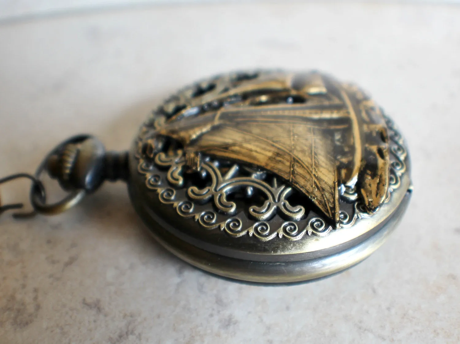 Nautical battery operated pocket watch with sailboat