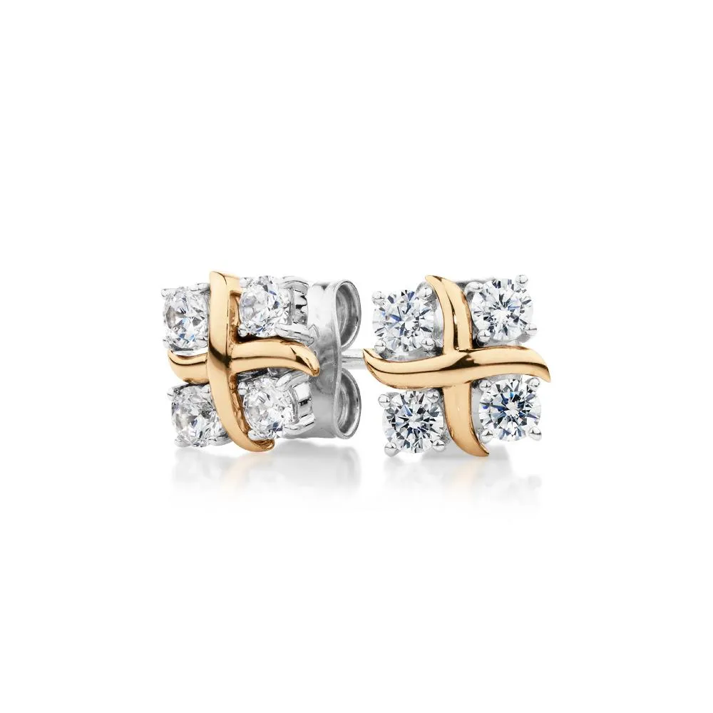 Round Brilliant fancy earrings with 0.48 carats* of diamond simulants in 10 carat yellow gold and sterling silver