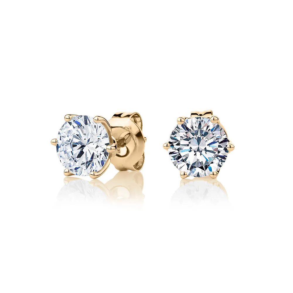 Round Brilliant stud earrings with 2 carats* of diamond simulants in 10 carat yellow gold