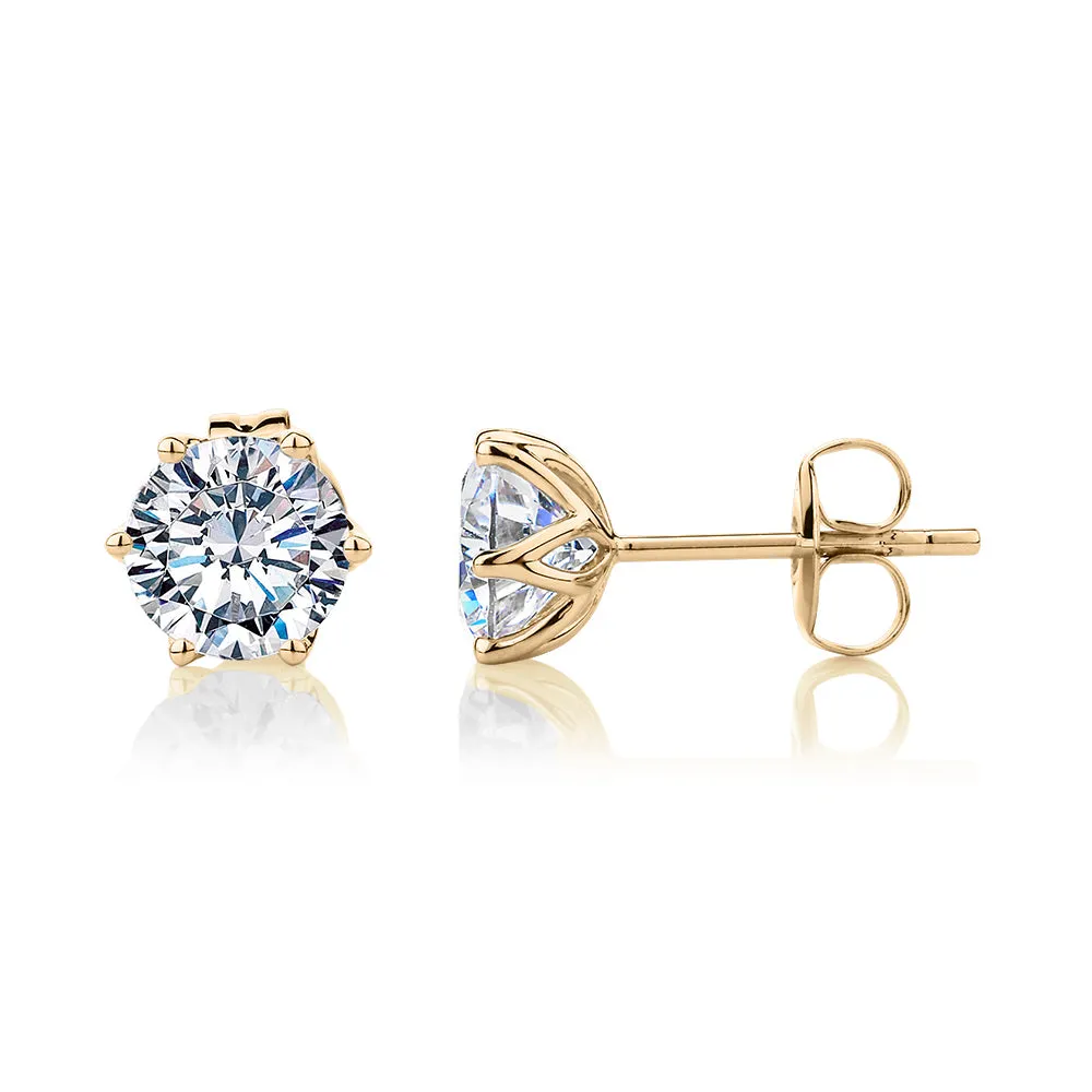 Round Brilliant stud earrings with 2 carats* of diamond simulants in 10 carat yellow gold