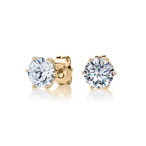 Round Brilliant stud earrings with 2 carats* of diamond simulants in 10 carat yellow gold