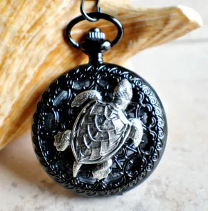 Turtle pocket watch battery operated in black.